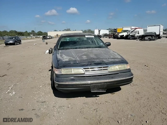 1996 Ford Crown Victoria with VIN 2FALP73WXTX196123, listed as a Copart auction lot 77444094 with 173,540 mi miles and Salvage Title. Bid and sale history available at carsss.com. Image 11.