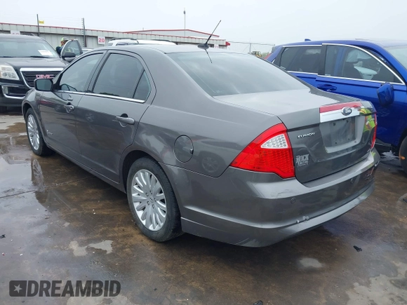 2012 Ford Fusion Hybrid z VIN 3FADP0L33CR289548, wystawiony jako IAAI lot #41905806 z przebiegiem 121 233 mil mil oraz . Historia ofert i sprzedaży dostępna na DreamBid. Obrazek 3.