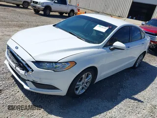 2018 Ford Fusion SE z VIN 3FA6P0H77JR142828, wystawiony jako IAAI lot #41820649 z przebiegiem 208 517 mil mil oraz . Historia ofert i sprzedaży dostępna na DreamBid. Obrazek 17.