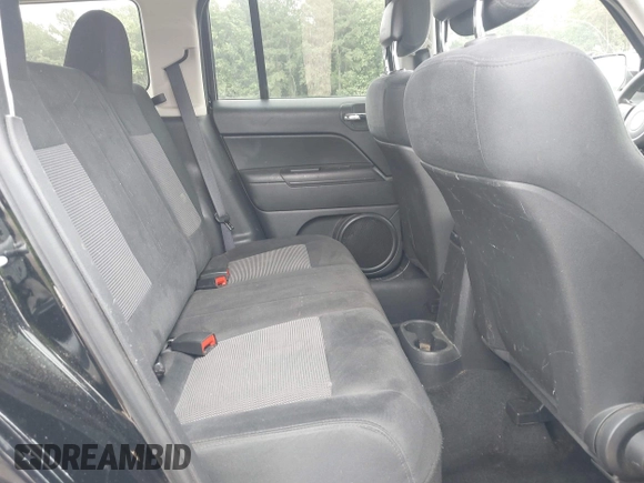 2013 Jeep Patriot Sport with VIN 1C4NJPBA9DD187660, listed as a IAAI auction lot 42462229 with 140,255 mi miles and . Bid and sale history available at DreamBid. Image 8.