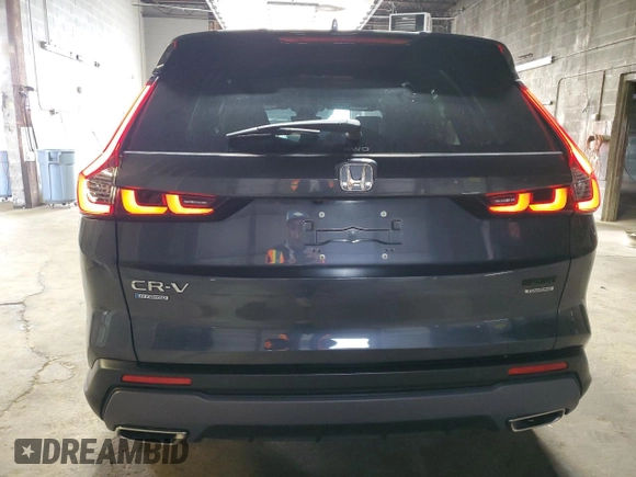 2023 Honda CR-V Sport Touring with VIN 5J6RS6H93PL012363, listed as a Copart auction lot 54665365 with 15,003 mi miles and Salvage Title. Bid and sale history available at DreamBid. Image 6.