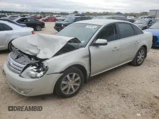 2008 Ford Taurus SEL with VIN 1FAHP24W28G137622, listed as a Copart auction lot 82828674 with 118,888 mi miles and Salvage Title. Bid and sale history available at carsss.com. Image 1.