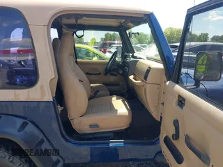2001 Jeep Wrangler SE with VIN 1J4FA29P01P344644, listed as a IAAI auction lot 42170936 with 130,938 mi miles and . Bid and sale history available at DreamBid. Image 5.