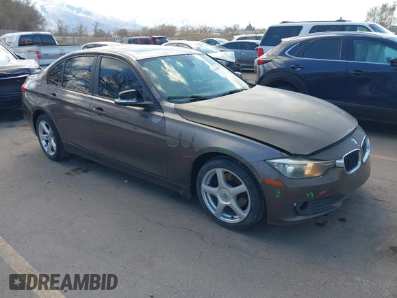 2014 BMW 3 Series 320i xDrive with VIN WBA3C3C58EF983816, listed as a IAAI auction lot 41949430 with 111,627 mi miles. Bid and sale history available at carsss.com. Image 1.