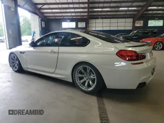 2014 BMW M6 z VIN WBSLX9C58ED160480, wystawiony jako Copart lot #64464985 z przebiegiem 58 514 mil mil oraz Czysty tytuł • Clean title. Historia ofert i sprzedaży dostępna na DreamBid. Obrazek 2.