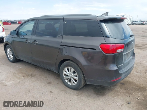 2015 Kia Sedona LX with VIN KNDMB5C13F6072586, listed as a IAAI auction lot 42090232 with 125,818 mi miles. Bid and sale history available at carsss.com. Image 3.