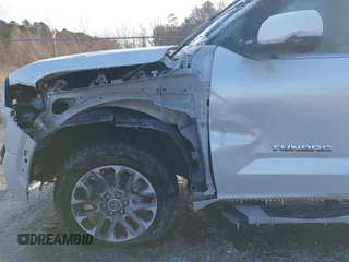 2023 Toyota Tundra Limited with VIN 5TFJA5DB8PX070681, listed as a IAAI auction lot 41617433 with 57,693 mi miles and . Bid and sale history available at DreamBid. Image 18.