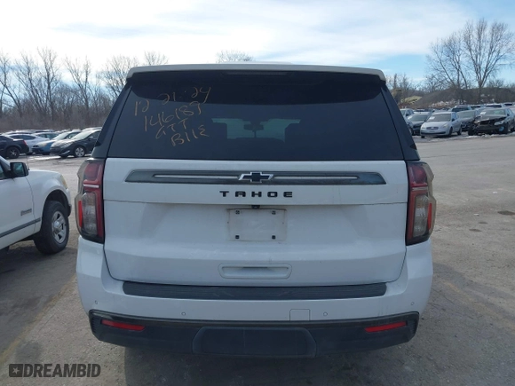 2021 Chevrolet Tahoe Z71 with VIN 1GNSKPKDXMR318664, listed as a IAAI auction lot 41382037 with 136,125 mi miles. Bid and sale history available at carsss.com. Image 17.