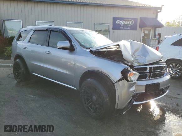 2015 Dodge Durango Limited with VIN 1C4RDJDG2FC771723, listed as a Copart auction lot 54155275 with 130,793 mi miles and Non repairable. Bid and sale history available at DreamBid. Image 4.