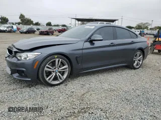 2017 BMW 4 Series 440i with VIN WBA4E3C51HG187292, listed as a Copart auction lot 58738664 with 76,176 mi miles and Salvage title. Bid and sale history available at DreamBid. Image 1.