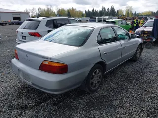 1999 Acura TL with VIN 19UUA5657XA021688, listed as a IAAI auction lot 41997466 with 241,232 mi miles. Bid and sale history available at carsss.com. Image 4.