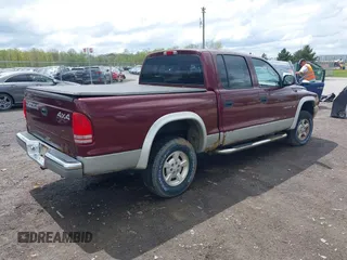 2002 Dodge Dakota z VIN 1B7HG48X92S626936, wystawiony jako IAAI lot #42192429 z przebiegiem 170 746 mil mil oraz . Historia ofert i sprzedaży dostępna na DreamBid. Obrazek 4.