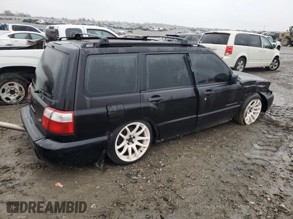 2001 Subaru Forester S w/Premium Pkg with VIN JF1SF65611H730807, listed as a Copart auction lot 84241384 with 221,698 mi miles and Salvage Title. Bid and sale history available at carsss.com. Image 3.