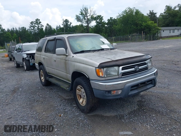 1999 Toyota 4Runner SR5 z VIN JT3GN86RXX0122884, wystawiony jako IAAI lot #42475427 z przebiegiem 143 853 mil mil oraz . Historia ofert i sprzedaży dostępna na DreamBid. Obrazek 1.