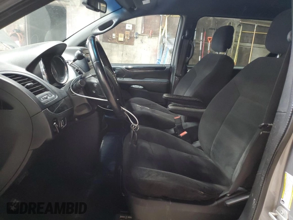 2014 Dodge Grand Caravan American Value with VIN 2C4RDGBG7ER451633, listed as a Copart auction lot 55100195 with 196,821 mi miles and Clean Title. Bid and sale history available at DreamBid. Image 7.