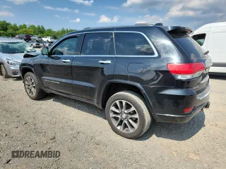 2017 Jeep Grand Cherokee Overland z VIN 1C4RJFCG4HC818132, wystawiony jako Copart lot #62642775 z przebiegiem 116 815 mil mil oraz Szkoda całkowita • Salvage title. Historia ofert i sprzedaży dostępna na DreamBid. Obrazek 2.