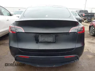 2022 Tesla Model Y Performance z VIN 7SAYGDEF4NF350696, wystawiony jako IAAI lot #41662924 z przebiegiem 36 747 mil mil oraz . Historia ofert i sprzedaży dostępna na DreamBid. Obrazek 16.