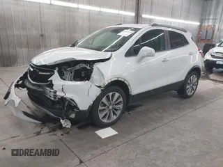 2018 Buick Encore Preferred with VIN KL4CJESB7JB596133, listed as a IAAI auction lot 41085078 with 99,000 mi miles. Bid and sale history available at carsss.com. Image 2.