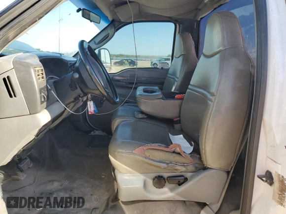 2004 Ford F-250 with VIN 1FDNF20L04ED58147, listed as a Copart auction lot 51791385 with 374,472 mi miles and Salvage title. Bid and sale history available at DreamBid. Image 7.