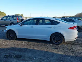 2018 Ford Fusion SE z VIN 3FA6P0H77JR108212, wystawiony jako IAAI lot #41208435 z przebiegiem 68 825 mil mil oraz . Historia ofert i sprzedaży dostępna na DreamBid. Obrazek 15.