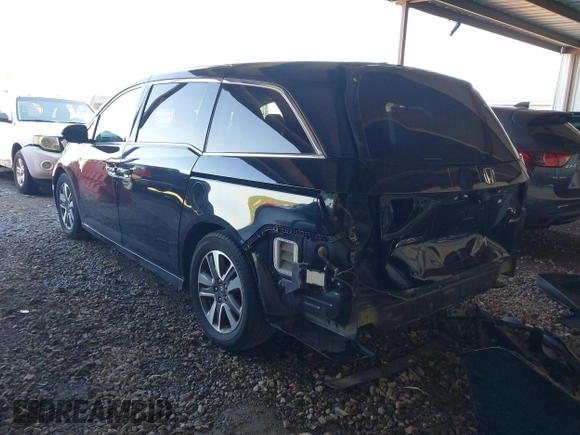 2014 Honda Odyssey Touring with VIN 5FNRL5H94EB110590, listed as a IAAI auction lot 42092929 with 242,338 mi miles and . Bid and sale history available at DreamBid. Image 3.