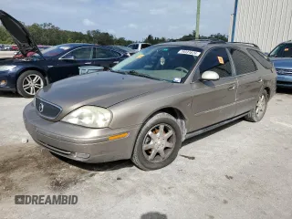 2003 Mercury Sable LS Premium z VIN 1MEFM59S03A606329, wystawiony jako Copart lot #79331624 z przebiegiem 152 059 mil mil oraz Nie do naprawy. Historia ofert i sprzedaży dostępna na DreamBid. Obrazek 1.