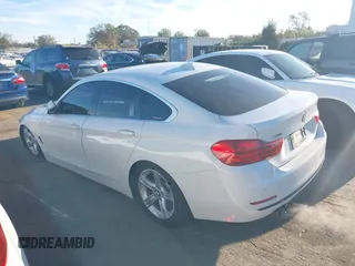 2016 BMW 4 Series 428i xDrive with VIN WBA4C9C54GG139275, listed as a IAAI auction lot 40828786 with 128,124 mi miles and . Bid and sale history available at carsss.com. Image 14.