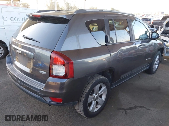 2016 Jeep Compass Latitude with VIN 1C4NJDEB2GD685383, listed as a IAAI auction lot 41968450 with 273,938 mi miles. Bid and sale history available at carsss.com. Image 4.