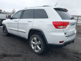 2013 Jeep Grand Cherokee Overland with VIN 1C4RJFCT4DC640553, listed as a IAAI auction lot 41311413 with 146,212 mi miles. Bid and sale history available at carsss.com. Image 3.