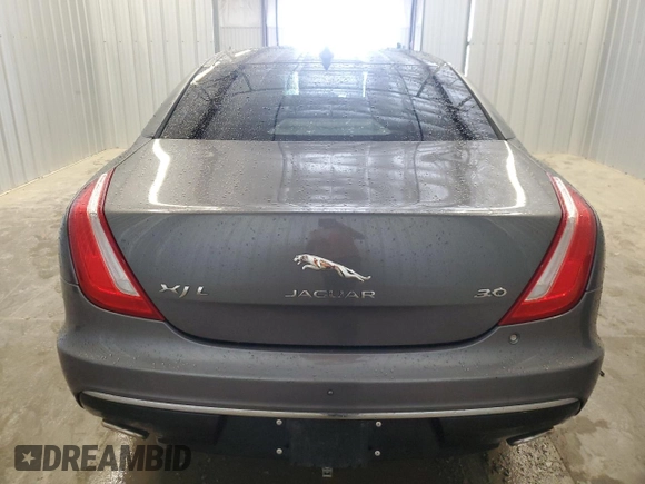 2019 Jaguar XJ Portfolio with VIN SAJWA2G71K8W19797, listed as a Copart auction lot 54133195 with 57,446 mi miles and Salvage Title. Bid and sale history available at DreamBid. Image 6.