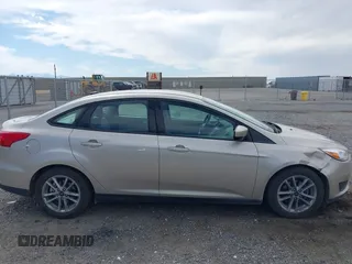 2018 Ford Focus SE with VIN 1FADP3FE7JL230870, listed as a IAAI auction lot 42021541 with 84,000 mi miles. Bid and sale history available at carsss.com. Image 13.