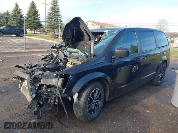 2019 Dodge Grand Caravan SE with VIN 2C4RDGBGXKR528085, listed as a IAAI auction lot 41946407 with 166,854 mi miles and . Bid and sale history available at DreamBid. Image 17.