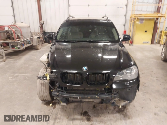 2012 BMW X5 35i with VIN 5UXZV4C55CL990510, listed as a IAAI auction lot 41849293 with 117,522 mi miles and . Bid and sale history available at DreamBid. Image 12.