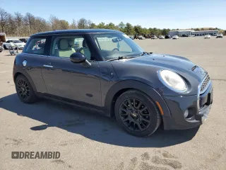 2014 MINI Hardtop S with VIN WMWXM7C54ET985344, listed as a Copart auction lot 55242945 with 87,017 mi miles and Salvage Title. Bid and sale history available at DreamBid. Image 4.