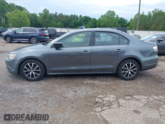 2013 Volkswagen Jetta S z VIN 3VW2K7AJ5DM369293, wystawiony jako IAAI lot #42172959 z przebiegiem 170 983 mil mil oraz . Historia ofert i sprzedaży dostępna na DreamBid. Obrazek 14.