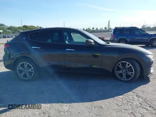 2019 Maserati Levante z VIN ZN661XUA6KX308351, wystawiony jako IAAI lot #41273822 z przebiegiem Nie podano mil oraz . Historia ofert i sprzedaży dostępna na DreamBid. Obrazek 13.