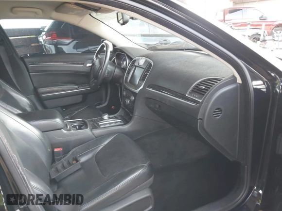 2016 Chrysler 300 Anniversary Edition with VIN 2C3CCAAG4GH141217, listed as a IAAI auction lot 42121809 with 74,739 mi miles and . Bid and sale history available at DreamBid. Image 5.