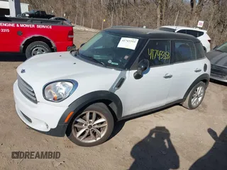2012 MINI Countryman z VIN WMWZB3C51CWM03056, wystawiony jako IAAI lot #41743353 z przebiegiem 117 290 mil mil oraz . Historia ofert i sprzedaży dostępna na DreamBid. Obrazek 2.