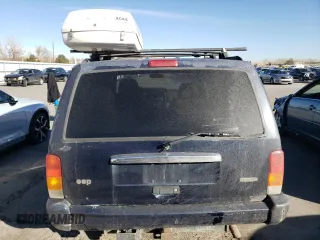 2000 Jeep Cherokee Limited with VIN 1J4FF68S0YL250926, listed as a Copart auction lot 84837244 with 141,020 mi miles and Salvage Title. Bid and sale history available at carsss.com. Image 6.