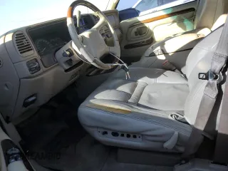 2000 Cadillac Escalade z VIN 1GYEK63R3YR218500, wystawiony jako Copart lot #77676354 z przebiegiem 164 602 mil mil oraz Tytuł czysty. Historia ofert i sprzedaży dostępna na DreamBid. Obrazek 7.