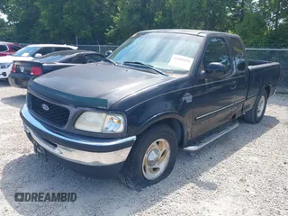 1998 Ford F-150 with VIN 1FTZX1762WNB88647, listed as a IAAI auction lot 42682271 with 187,520 mi miles and . Bid and sale history available at DreamBid. Image 2.