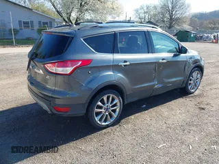 2015 Ford Escape SE with VIN 1FMCU9G97FUA89251, listed as a IAAI auction lot 41919240 with 148,472 mi miles and . Bid and sale history available at DreamBid. Image 4.