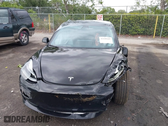 2023 Tesla Model 3 z VIN 5YJ3E1EA4PF433466, wystawiony jako IAAI lot #42249247 z przebiegiem 39 808 mil mil oraz . Historia ofert i sprzedaży dostępna na DreamBid. Obrazek 13.