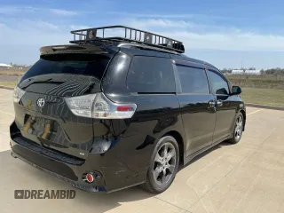 2014 Toyota Sienna SE with VIN 5TDXK3DC3ES441544, listed as a Copart auction lot 50452775 with 230,704 mi miles and Clean Title. Bid and sale history available at DreamBid. Image 4.