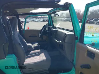 1997 Jeep Wrangler Sport with VIN 1J4FY19S2VP423426, listed as a IAAI auction lot 41734992 with 164,706 mi miles. Bid and sale history available at carsss.com. Image 5.