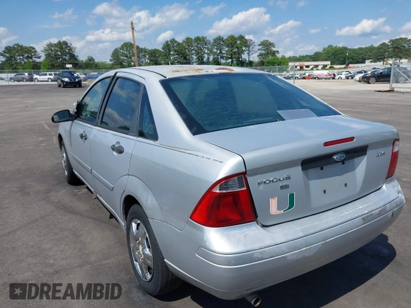 2006 Ford Focus S z VIN 1FAFP34N66W203290, wystawiony jako IAAI lot #42273443 z przebiegiem 193 482 mil mil oraz . Historia ofert i sprzedaży dostępna na DreamBid. Obrazek 3.