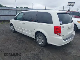 2012 Dodge Grand Caravan SE with VIN 2C4RDGBG8CR115003, listed as a IAAI auction lot 42217153 with 196,833 mi miles and . Bid and sale history available at DreamBid. Image 3.
