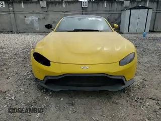 2019 Aston Martin Vantage z VIN SCFSMGAW6KGN01897, wystawiony jako Copart lot #51802505 z przebiegiem Nie podano mil oraz Szkoda całkowita • Salvage title. Historia ofert i sprzedaży dostępna na DreamBid. Obrazek 10.