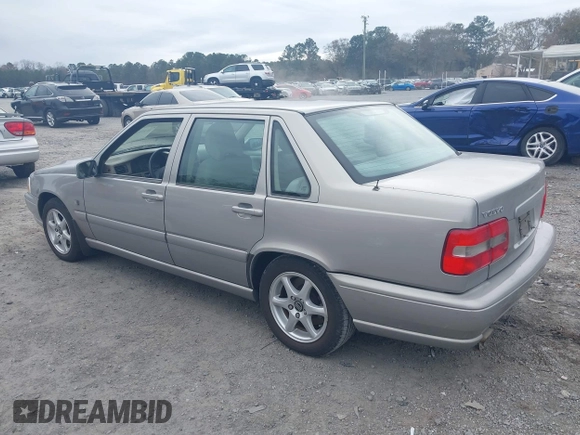 1999 Volvo S70 z VIN YV1LS55AXX1584296, wystawiony jako IAAI lot #41171386 z przebiegiem 163 872 mil mil oraz . Historia ofert i sprzedaży dostępna na DreamBid. Obrazek 3.