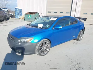 2010 Scion tC with VIN JTKDE3B78A0315248, listed as a IAAI auction lot 41442648 with 125,037 mi miles. Bid and sale history available at carsss.com. Image 2.
